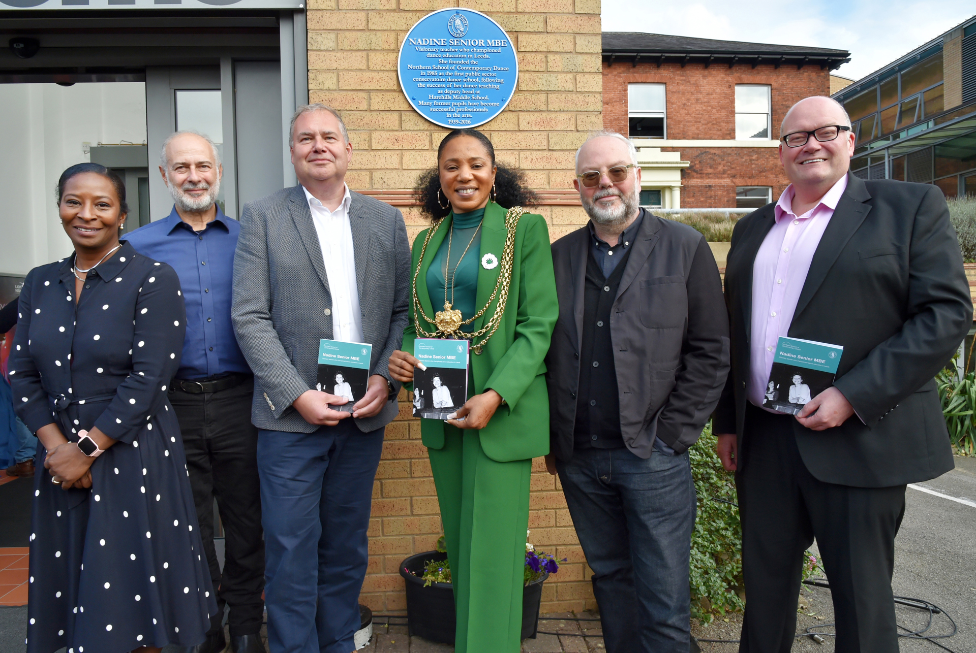 Pictured at Nadine Senior MBE blue plaque unveiling (L-R): Sharon Watson - CEO & Principal at NSCD, Nadine’s son Gareth Senior and Councillor Abigail Marshall Katung - the Lord Mayor of Leeds.  Photography courtesy of Civic Trust - by Graham Fotherby