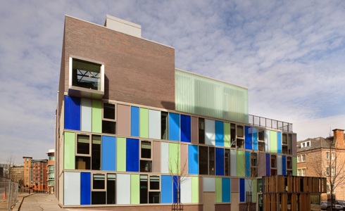 Image of Dance City building. Large colourful building with blue and green coloured blocks on it